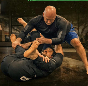 Danaher's New Instructional Has AI Cover Art. The Training Partner Has Four Legs. BJJ Fanatics Has Done This Before.