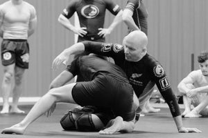 Danaher Says Go Back to Your First Armbar. The 20-Hour Back System Can Wait.