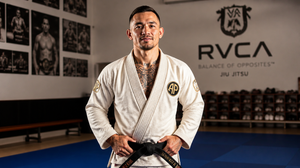 Max Holloway Got His BJJ Black Belt the Hard Way — Charles Oliveira Submitted Him Into It. Now He's Fighting McGregor.